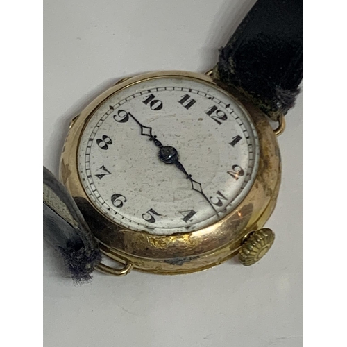 562 - A VINTAGE SWISS 9CT YELLOW GOLD CASED LADIES TRENCH STYLE WATCH