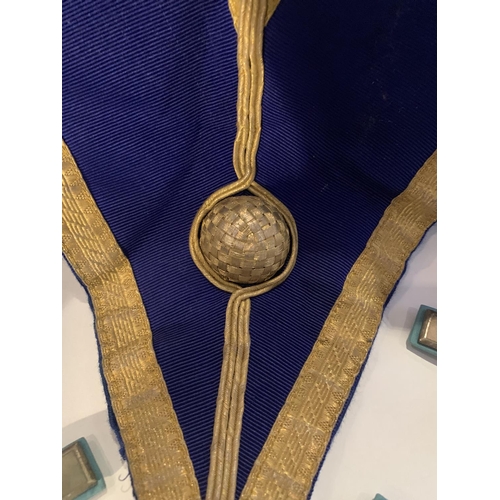 565 - A MASONIC SASH WITH HALLMARKED SILVER GILT FOB CHESHIRE FOB, FURTHER GILT MEDALS ETC