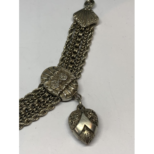 595 - AN ORNATE SILVER HALF ALBERT WATCH CHAIN