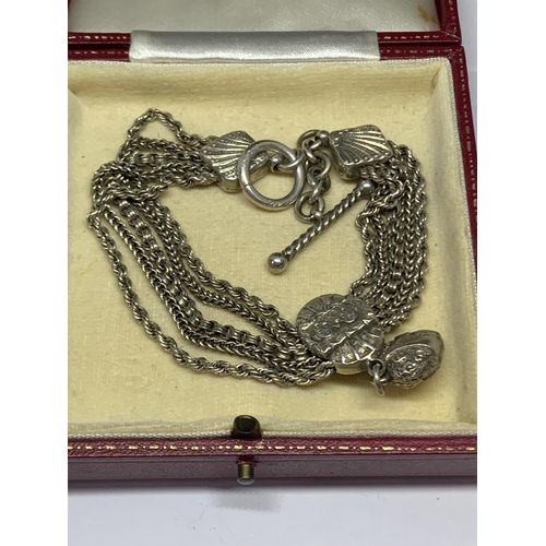 595 - AN ORNATE SILVER HALF ALBERT WATCH CHAIN