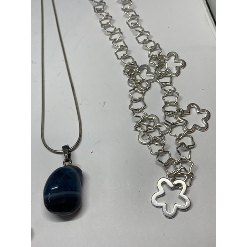 618 - FOUR SILVER NECKLACES WITH PENDANTS