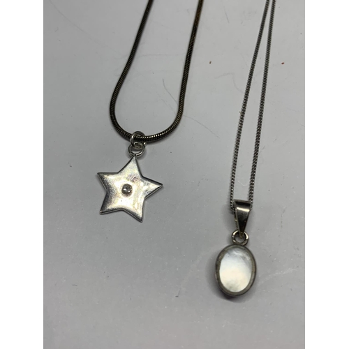 621 - FOUR SILVER NECKLACES WITH PENDANTS