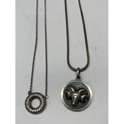 621 - FOUR SILVER NECKLACES WITH PENDANTS