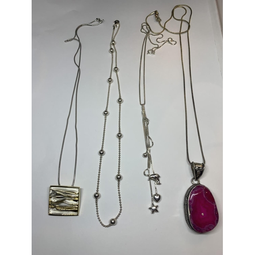 566 - FOUR MARKED SILVER NECKLACES THREE WITH PENDANTS AND ONBE WITH A BALL DESIGN