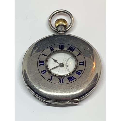 570 - A CONTINENTAL SILVER HALF HUNTER POCKET WATCH