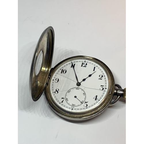 570 - A CONTINENTAL SILVER HALF HUNTER POCKET WATCH