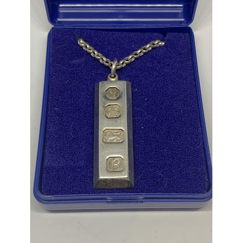 574 - A HALLMARKED SHEFFIELD SILVER INGOT OMN A CHAIN IN A PRESENTATION BOX