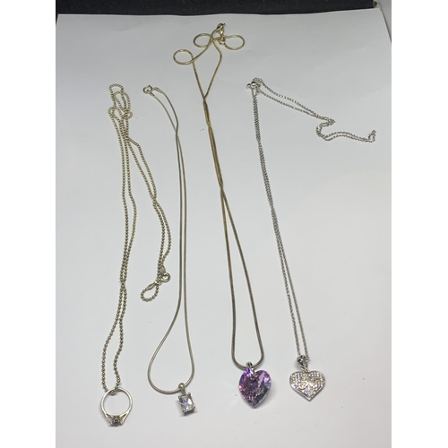 576 - FOUR SILVER NECKLACES WITH PENDANTS