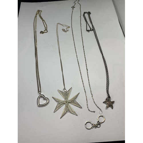 589 - FOUR SILVER NECKLACES WITH PENDANTS ONE A/F