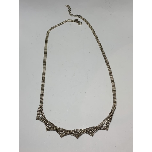 594 - A SILVER NECKLACE LENGTH 30 INCHES