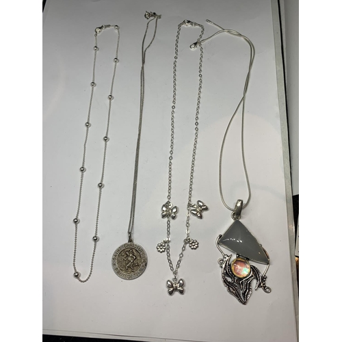 596 - FOUR SILVER NECKLACES WITH PENDANTS