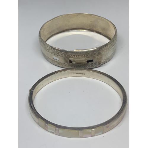 609 - TWO SILVER BANGLES