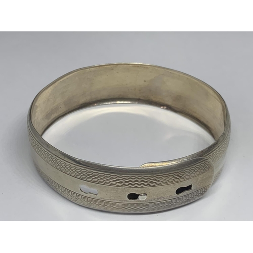 609 - TWO SILVER BANGLES