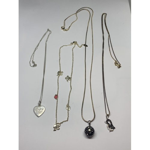 613 - FOUR SILVER NECKLACES WITH PENDANTS