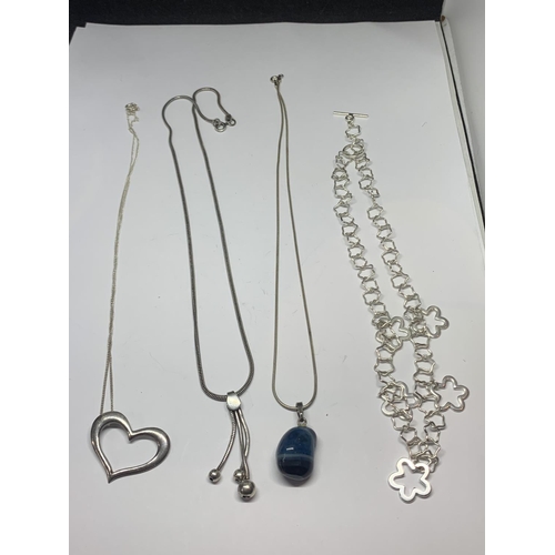 618 - FOUR SILVER NECKLACES WITH PENDANTS