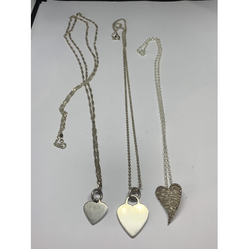 620 - THREE SILVER HEART DESIGN NECKLACES