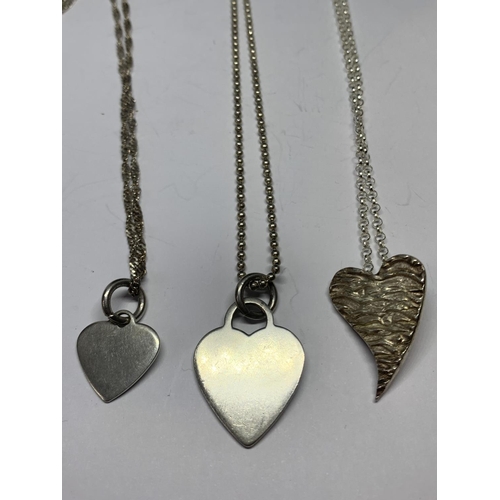 620 - THREE SILVER HEART DESIGN NECKLACES