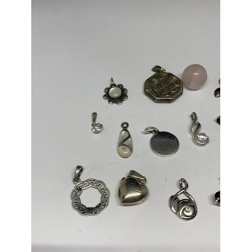 624 - EIGHTEEN VARIOUS SILVER PENDANTS