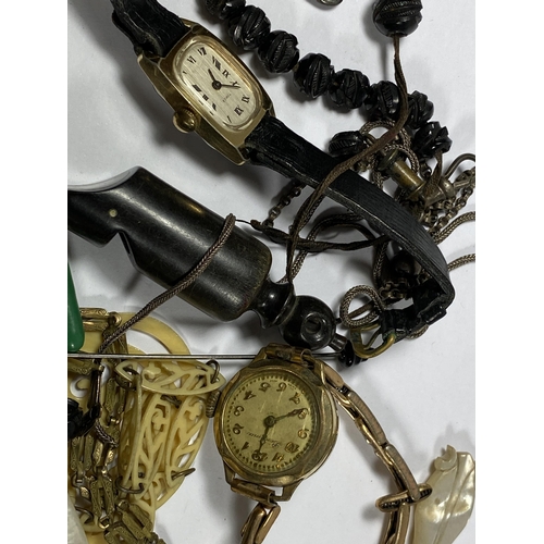 472 - A MIXED LOT OF VINTAGE JEWELLERY TO INCLUDE LADIES WATCHES, CARVED PENDANT, MIDDLE EASTERN BANGLE ET... 