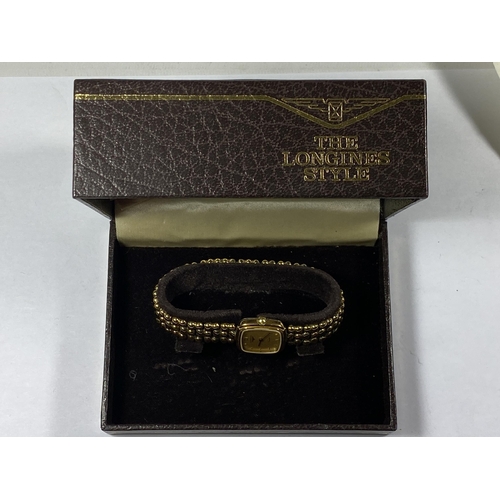 478 - A BOXED LADIES LONGINES GOLD PLATED WATCH WITH PURCHASE RECEIPT