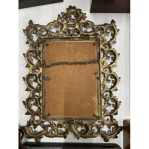 49 - A VINTAGE ORNATE BRASS PICTURE FRAME, 31 X 42CM