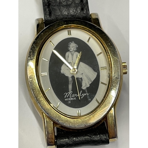 654 - A MARILYN MUNROE WRIST WATCH SEEN WORKING BUT NO WARRANTY