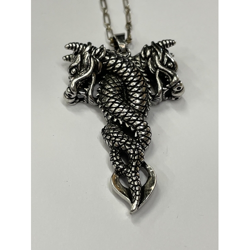 655 - A WHITE METAL DRAGON NECKLACE