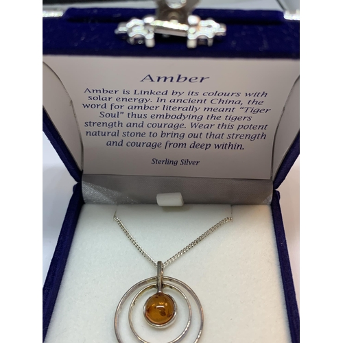 687 - A SILVER AND AMBER NECKLACE