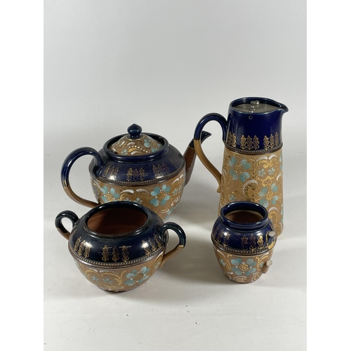 765 - A ROYAL DOULTON LAMBETH ART NOUVEAU FOUR PIECE TEASET, (JUG MISSING HANDLE)