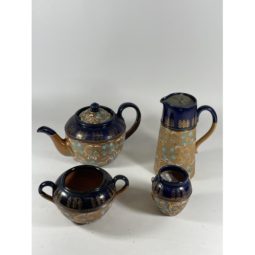 765 - A ROYAL DOULTON LAMBETH ART NOUVEAU FOUR PIECE TEASET, (JUG MISSING HANDLE)