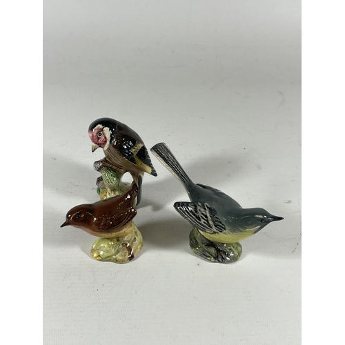 771 - A GROUP OF THREE BESWICK BIRDS