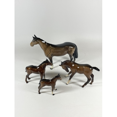 789 - A GROUP OF FOUR BESWICK BROWN GLOSS HORSE FIGURES