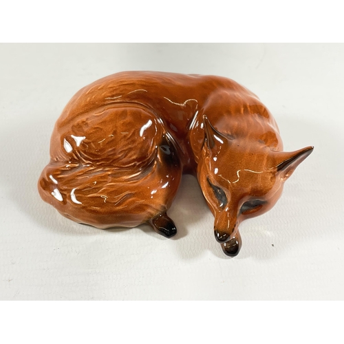 792 - A BESWICK LYING DOWN FOX GLOSS MODEL