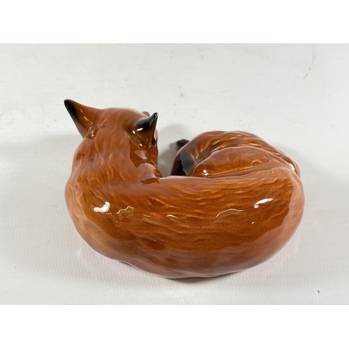 792 - A BESWICK LYING DOWN FOX GLOSS MODEL