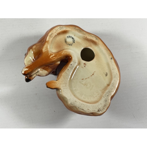 792 - A BESWICK LYING DOWN FOX GLOSS MODEL