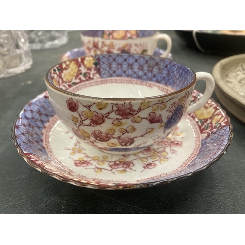 110 - FIVE VINTAGE CHINA CUPS AND SAUCERS