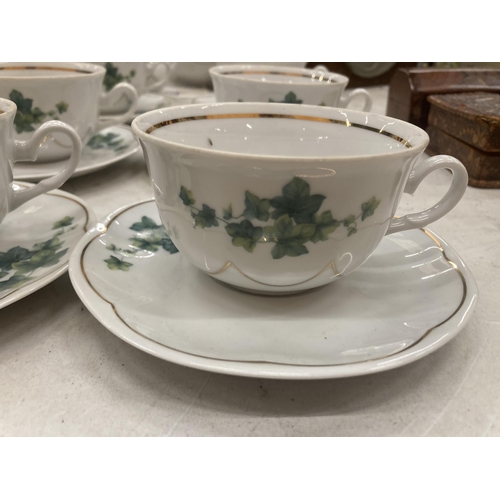 158 - A FIESTA TEASET TO INCLUDE A TEAPOT, SUGAR BOWL, CREAM JUG, SIX CUPS AND SAUCERS