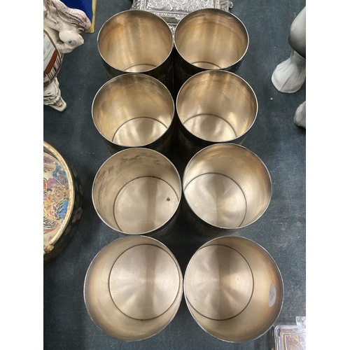 194 - A SET OF EIGHT SILVER PLATED 'CAVALIER' BEAKERS