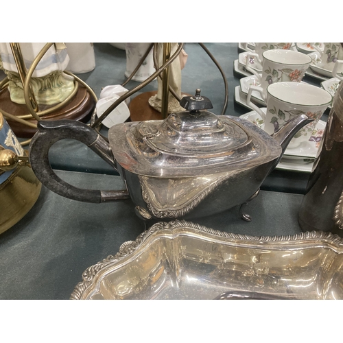 210 - A QUANTITY OF SILVER PLATED ITEMS TO INCLUDE TRAYS, A TEAPOT, HOT WATER JUG, CREAM JUG, SUGAR BOWL, ... 