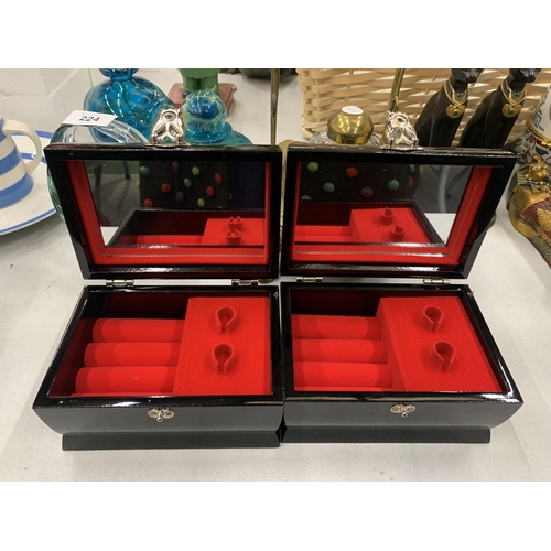 222 - TWO LACQUERED MUSICAL BOXES WITH MOTHER OF PEARL DECORATION