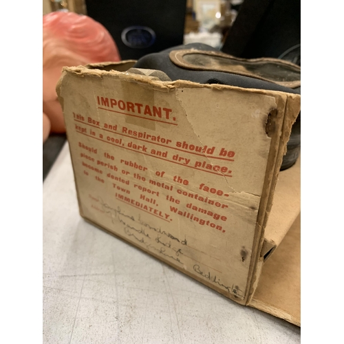 239 - A BOXED WORLD WAR II GAS MASK