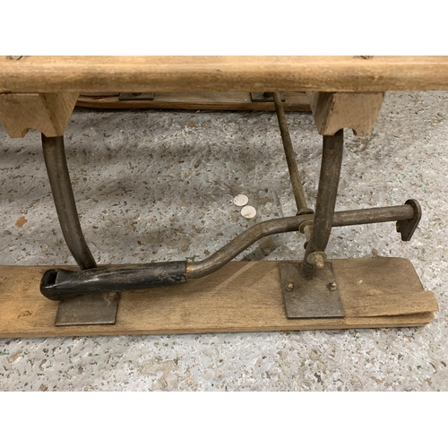 255 - A VINTAGE WOODEN SLEDGE WITH A STEERING WHEEL