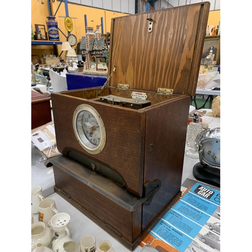 263 - A VINTAGE 'BLICK TIME RECORDERS' CLOCKING IN CLOCK IN A MAHOGANY CASE