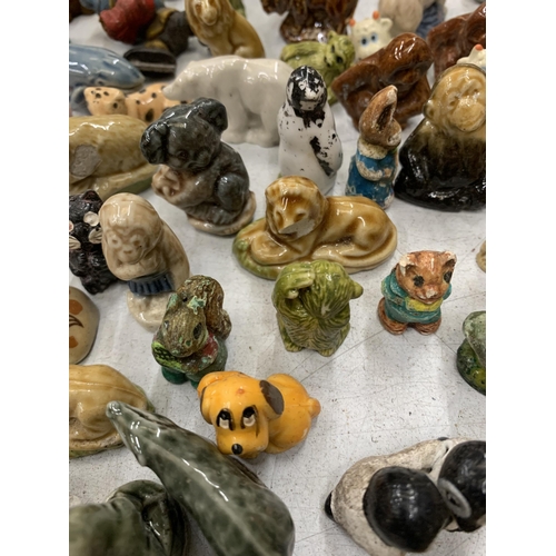 295 - A VERY LARGE QUANTITY OF VINTAGE MINIATURES TO INCLUDE FIGURES, WADE WHIMSIES, ANIMALS, PLATES, CUPS... 