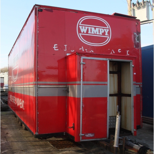 150 - A WIMPEY TRIPLE AXLE CATERING TRAILER WITH SOME FIRE DAMAGE NO VAT