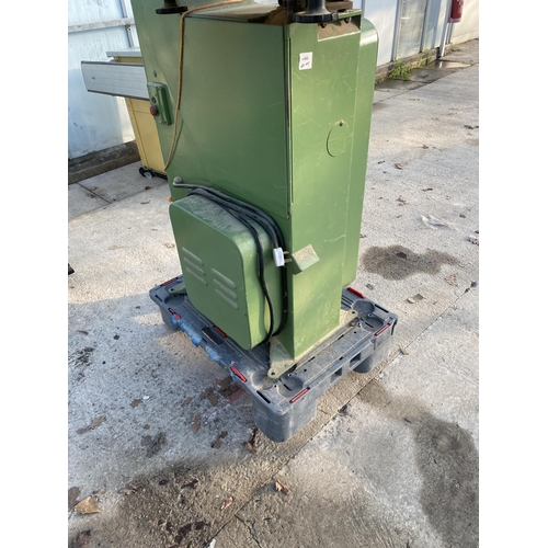 36 - AN INDUSTRIAL STARTRITE SINGLE PHASE BANDSAW COMPLETE WITH A SPARE BLADE AND FOUR WHEELED TROLLEY FO... 