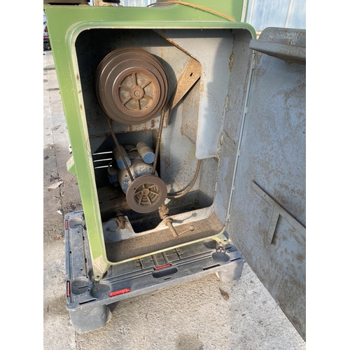 36 - AN INDUSTRIAL STARTRITE SINGLE PHASE BANDSAW COMPLETE WITH A SPARE BLADE AND FOUR WHEELED TROLLEY FO... 