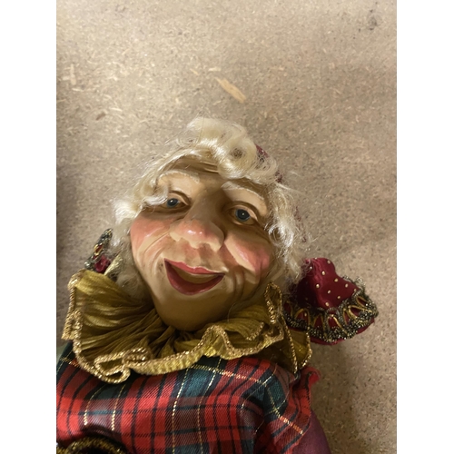 744A - A VINTAGE PLASTER HEADED JESTER DOLL