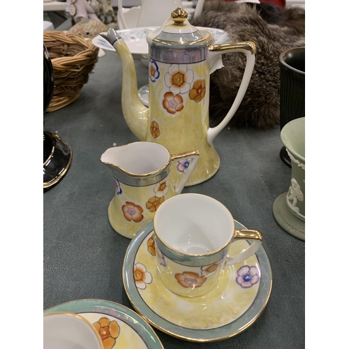 444 - A NORITAKE YELLOW AND FLORAL PATTERNED COFFEE SET TO INCLUDE A COFFEE POT, CREAM JUG, CUPS AND SAUCE... 