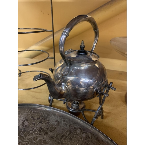 848 - A QUANTITY OF SILVER PLATED ITEMS TO INCLUDE A SPIRIT KETTLE WITH BURNER, TWO TRAYS AND A PLATE RACK